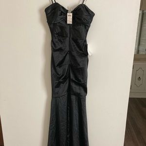Beautiful long black dinner or prom dress.